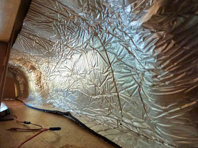 Thermal Insulation put in place without adhesive being exposed to check and trim